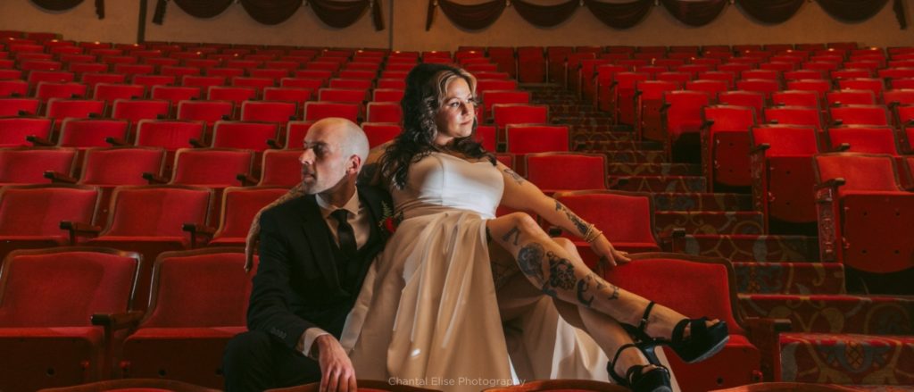Bride and groom in red Frauenthal seats