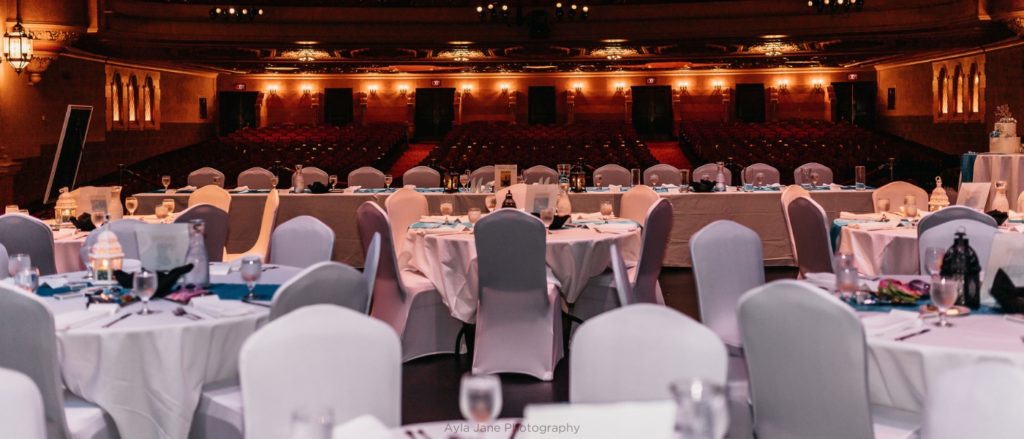 White reception tables on Frauenthal stage